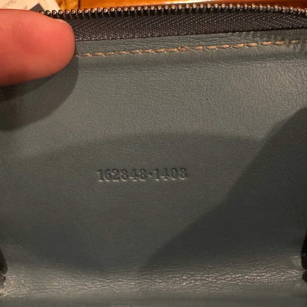 Gucci Black Embossed GG Zip Card Holder - Picture 8 of 14